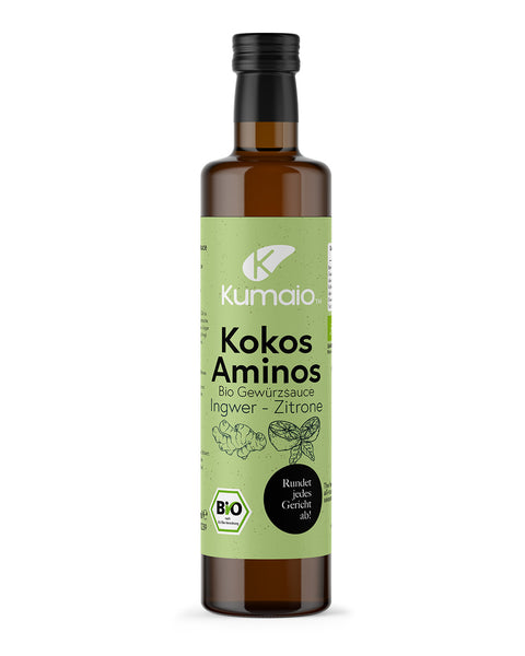 Kumaios Kokos-Aminos Gewürzsauce in einer braunen Glasflasche mit grünem Etikett und Ingwer-Zitronen-Geschmack.