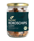 Bio Kokoschips mit Zimt aus Sri Lanka von Kumaio im Glasgefäß – vegane, knackige Snacks aus Bio-Kokosraspeln mit Zimtaroma